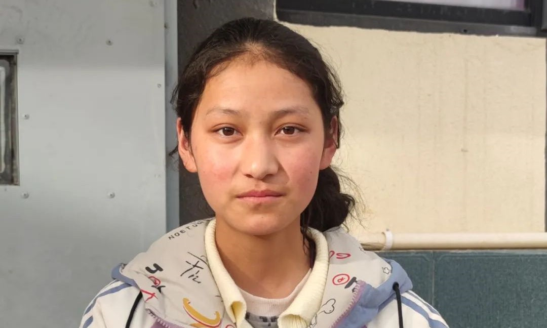 He Gave Up His Land for a School, She Grew Up Smiling in a Guard Room