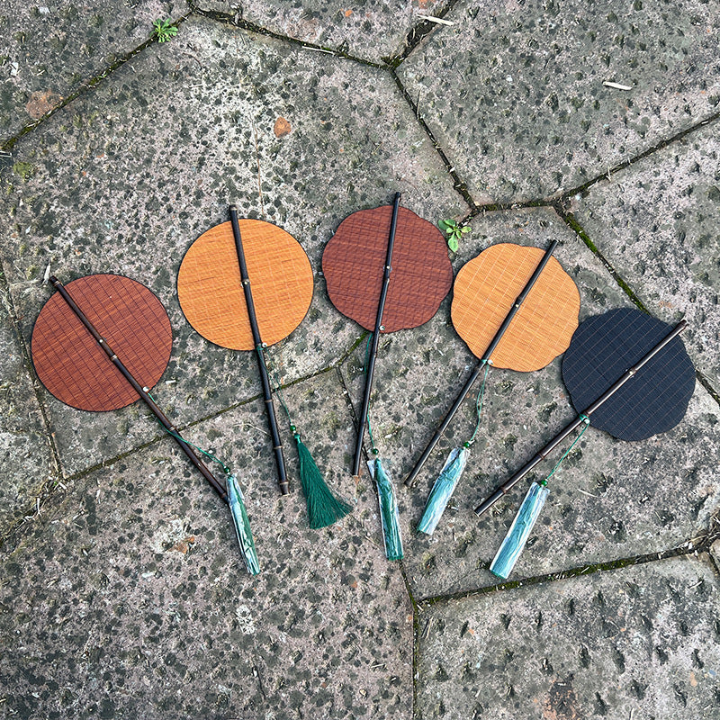 Whispers of Summer: Hand-woven bamboo silk fan with rollable design and tassel