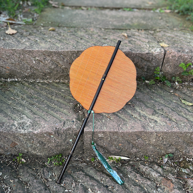 Whispers of Summer: Hand-woven bamboo silk fan with rollable design and tassel