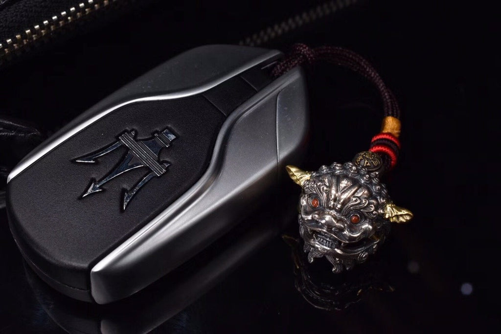 Tibetan Snow-Lion Guardian Pendant – Silver Bell & Feng-Shui Luck