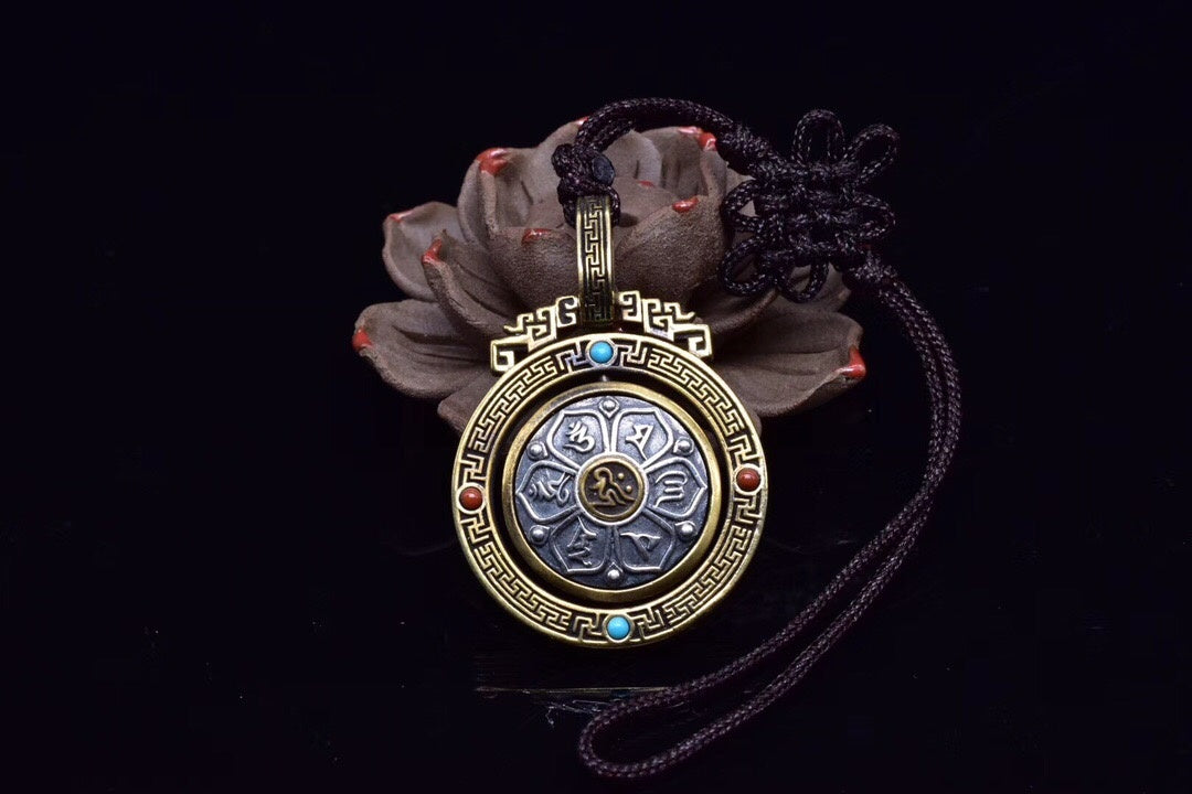 Six-Syllable Mantra Spinning Lotus Pendant – Silver & Brass