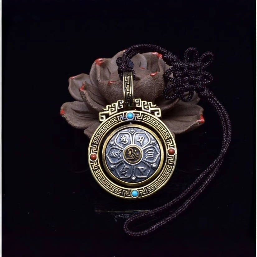 Six-Syllable Mantra Spinning Lotus Pendant – Silver & Brass